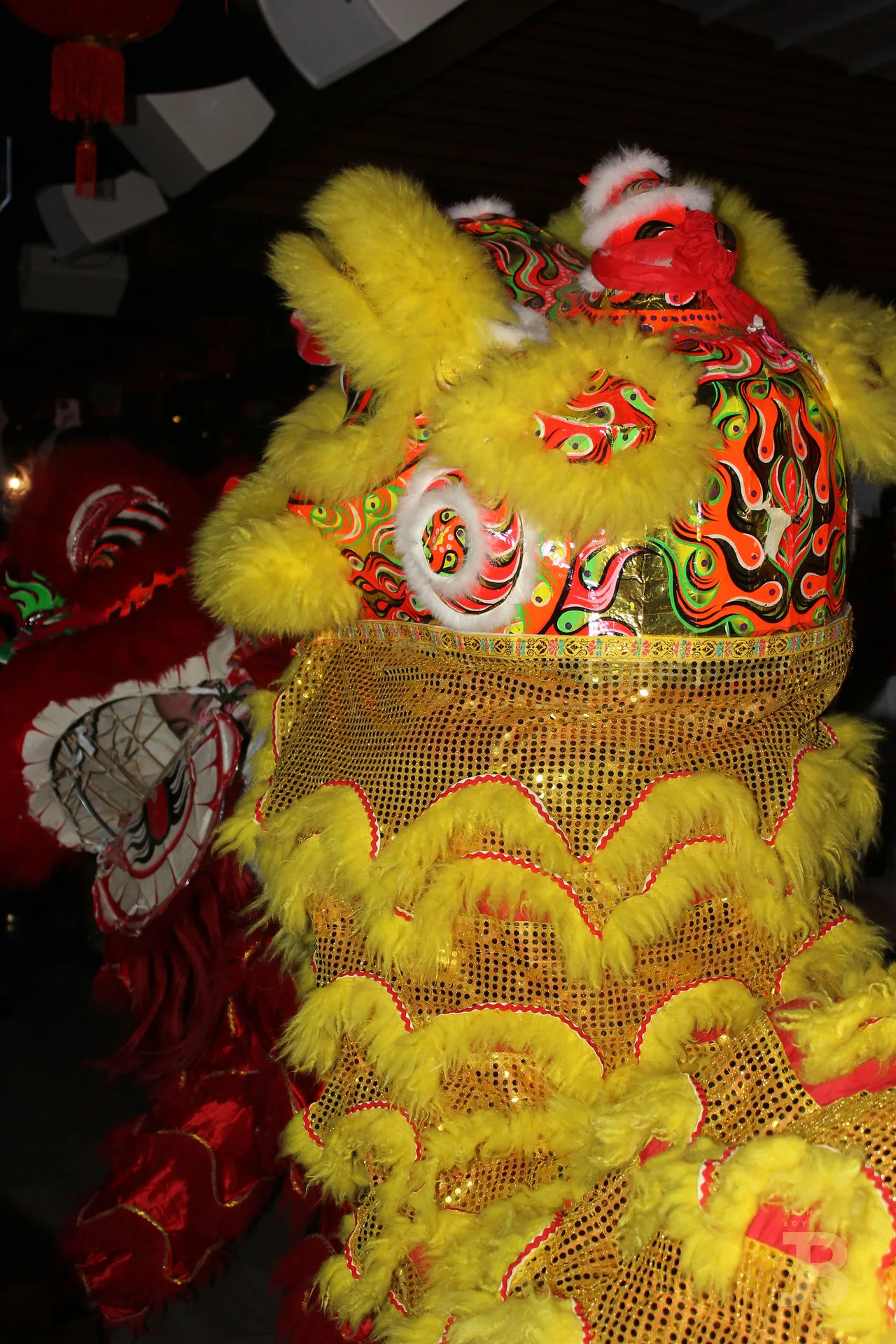 A gold and red lion-dance costume up close.